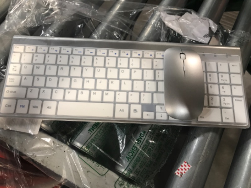 Photo 2 of Wireless Keyboard and Mouse Ultra Slim Combo, TopMate 2.4G Silent Compact USB Mouse and Scissor Switch Keyboard Set Silver White