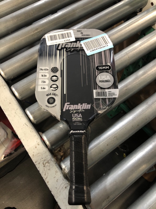 Photo 2 of **CRACK ON PADDLE ABOVE GRIP**Franklin Sports Pro Pickleball Paddles - Signature Series Pro Pickleball Paddle - 13mm + 16mm Polypropylene Cores 16mm Pro Player - Black