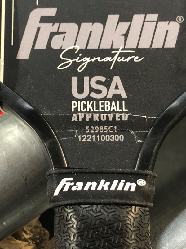 Photo 3 of **CRACK ON PADDLE ABOVE GRIP**Franklin Sports Pro Pickleball Paddles - Signature Series Pro Pickleball Paddle - 13mm + 16mm Polypropylene Cores 16mm Pro Player - Black