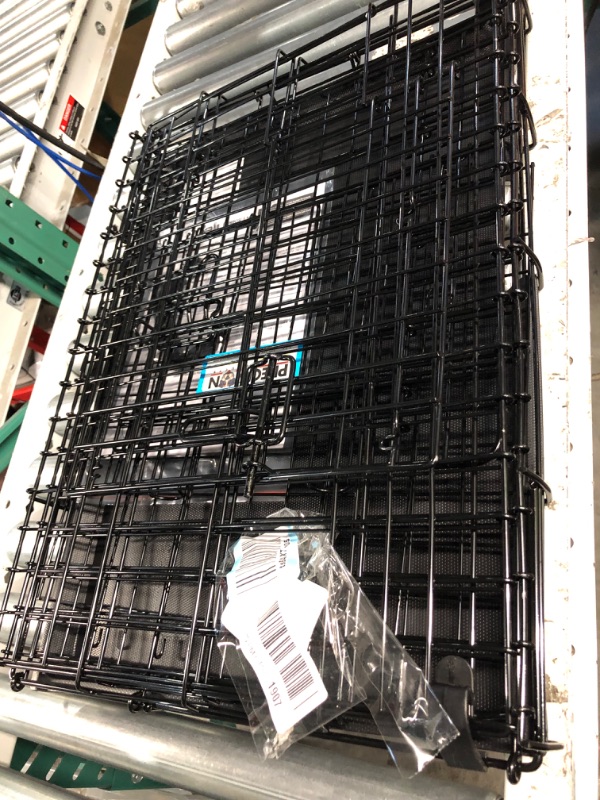 Photo 1 of **BOTTOM TRAY CRACKED, SEE PHOTO** 24" Dog Crate