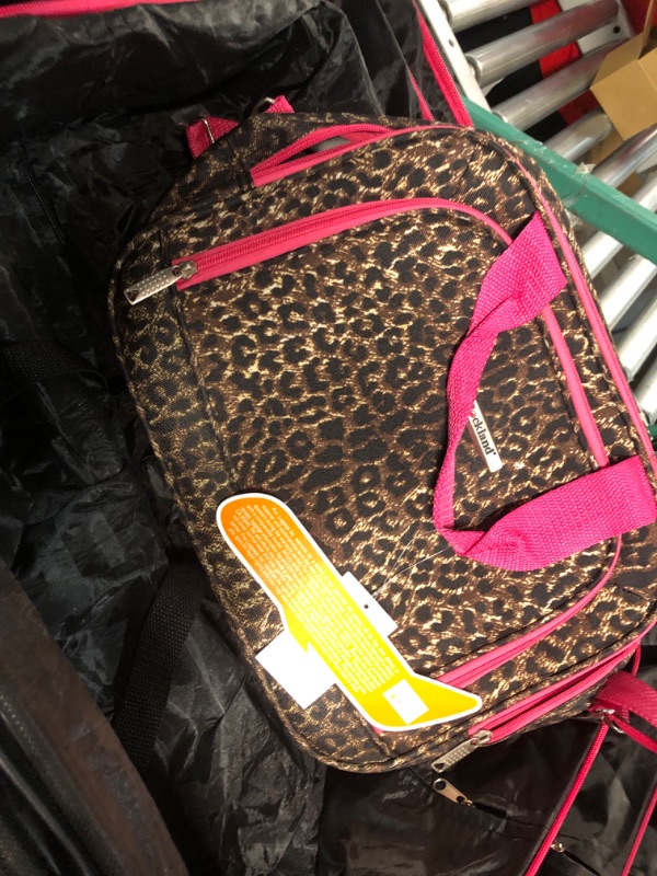 Photo 4 of * item used * minor damage *
Rockland Jungle Softside Upright Luggage, Pink Leopard, 4-Piece Set