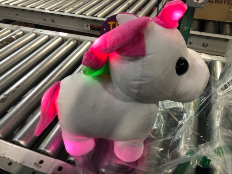 Photo 4 of Adopt Me! Neon Unicorn 12-Inch Light-Up Plush - Soft and Cuddly - Three Light-Up Modes - Directly from The #1 Game, Toys for Kids - Ages 6+