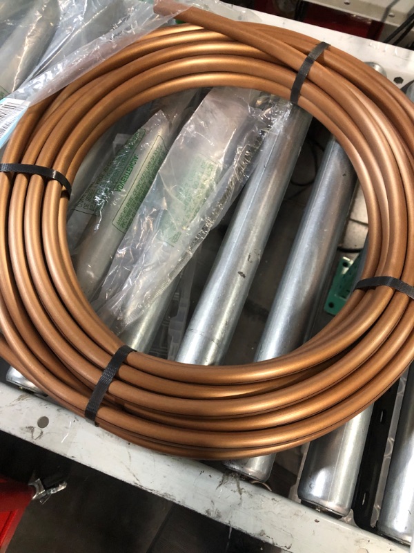 Photo 2 of *USED* Rain Bird ET256-50S Drip Irrigation Pressure Compensating 1/4" Emitter Tubing, 6" Emitter Spacing, 50 Roll, Brown Emitter Tubing - 6" Spacing 50' Roll