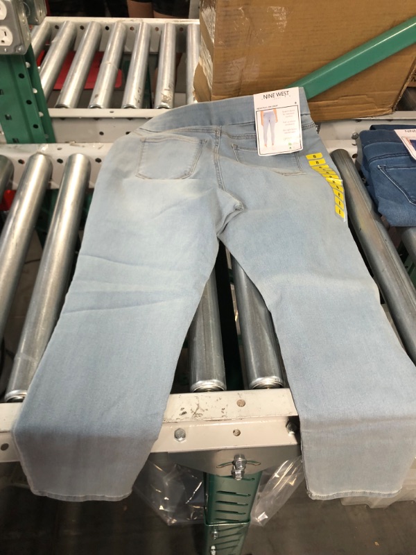 Photo 2 of ININE WEST JEANS, 1 SIZE 4 IN LIGHT BLUE, 2 SIZE 4 DARK BLUE ROLLED UP LEG