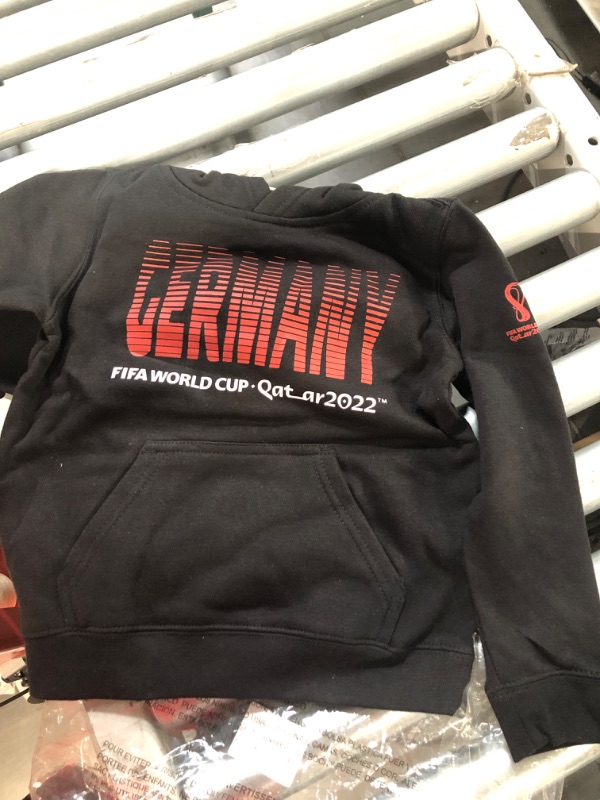 Photo 2 of **SEE NOTES**
Outerstuff Unisex Kids' FIFA World Cup Country Fade Fleece Hoodie Germany World Cup Soccer Team Medium Black