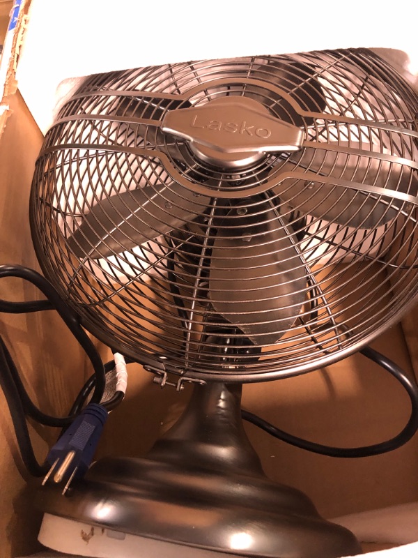 Photo 2 of Lasko 12" Classic Metal Table Fan - 12" Diameter - 3 Speed - Quiet, Carrying Handle, Oscillating - 17.3" Height x 13.3" Width - Metal