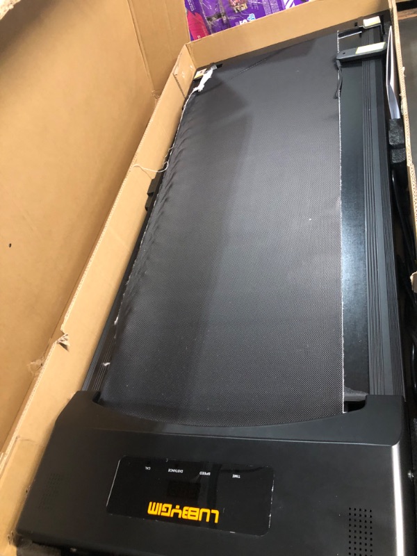 Photo 1 of **TURNS ON**
Walking Pad, Under Desk Treadmill 2 in 1, LUBBYGIM Walking Pad 300lbs Capacity Black