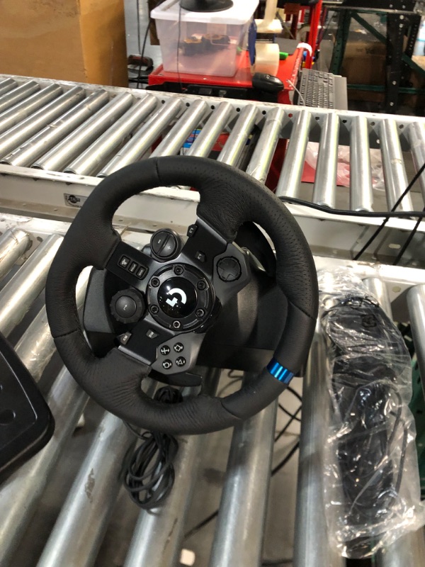 Photo 6 of Logitech G923 Racing Wheel and Pedals for PS 5, PS4 and PC featuring TRUEFORCE up to 1000 Hz Force Feedback, Responsive Pedal,