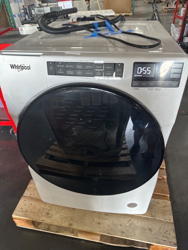 Photo 1 of **USED PRIOR, TESTED POWERS ON**  Whirlpool 4.5-cu ft High Efficiency Stackable Steam Cycle Front-Load Washer (White) ENERGY STAR