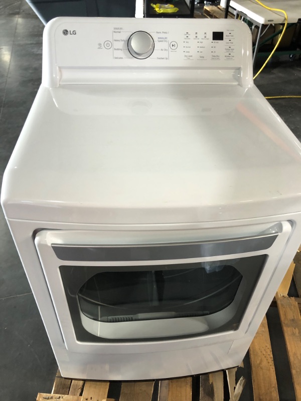 Photo 1 of **USED, TESTED POWERS ON**  LG 7.3 cu. ft. Ultra Large Capacity Gas Dryer with Sensor Dry Technology