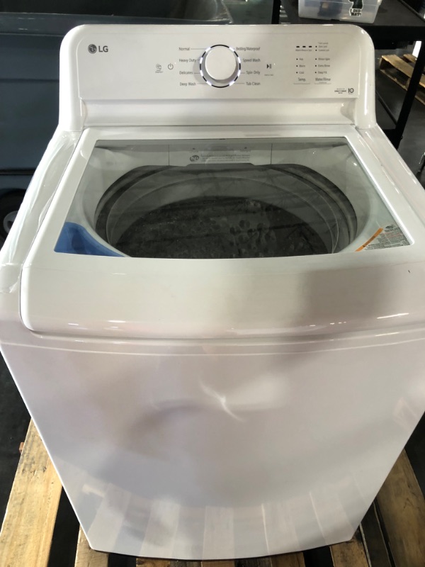 Photo 8 of **USED, TESTED POWERS ON** LG 4.1 cu. ft. Top Load Washer with 4-Way Agitator® and TurboDrum™ Technology