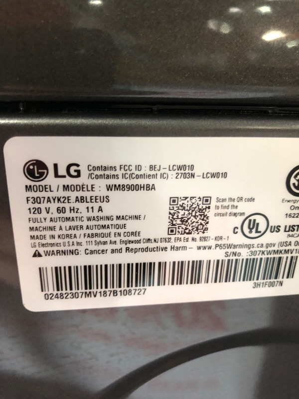 Photo 7 of **USED, POWERS ON, GIVES CODE OF CL**  LG 5.2 cu. ft. Mega Capacity Smart wi-fi Enabled Front Load Washer with TurboWash® and Built-In Intelligence