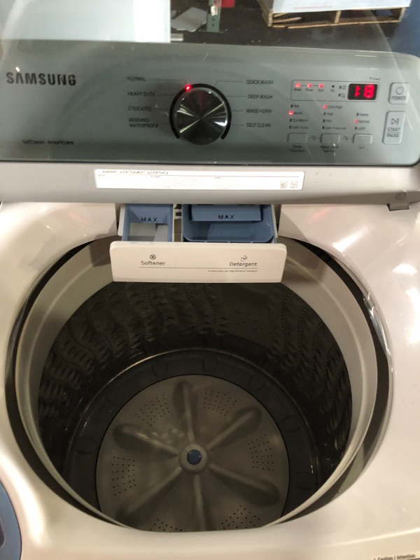 Photo 3 of **TESTED POWERS ON** SAMSUNG 4.5 cu. ft. Top Load Washer with Vibration Reduction Technology+ in White