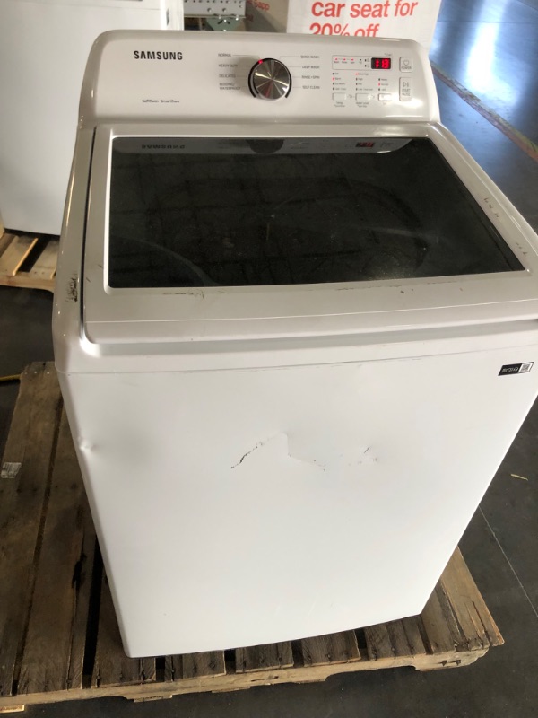 Photo 1 of **TESTED POWERS ON** SAMSUNG 4.5 cu. ft. Top Load Washer with Vibration Reduction Technology+ in White