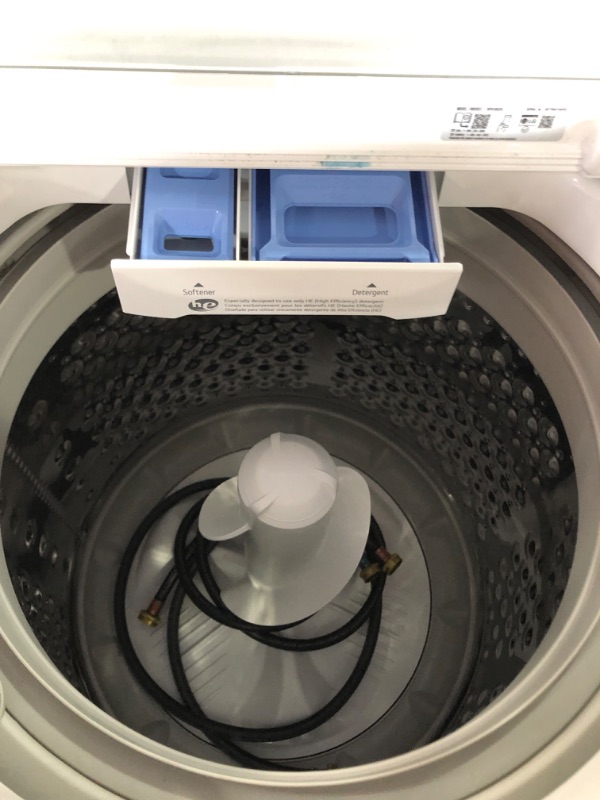 Photo 4 of **TESTED POWERS ON** USED LG 4.1 cu. ft. Top Load Washer with 4-Way Agitator® and TurboDrum™ Technology