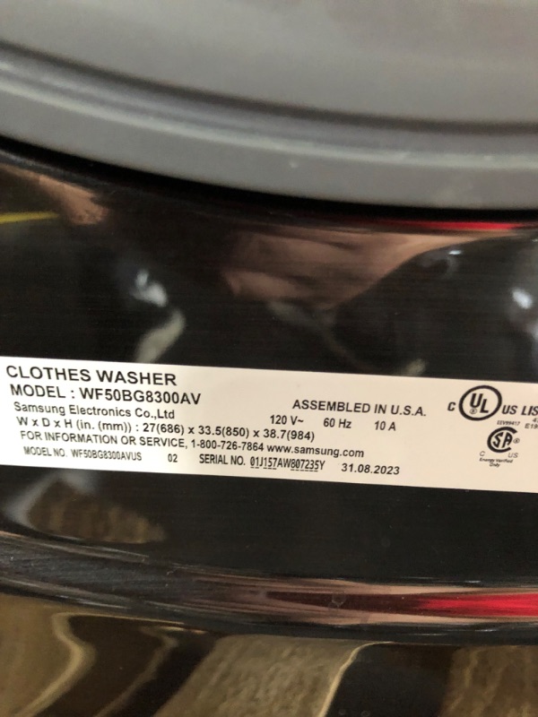 Photo 7 of **USED TESTED POWERS ON** SAMSUNG 5.0 cu. ft. Extra Large Capacity Smart Front Load Washer with Super Speed Wash and Steam in Brushed Black