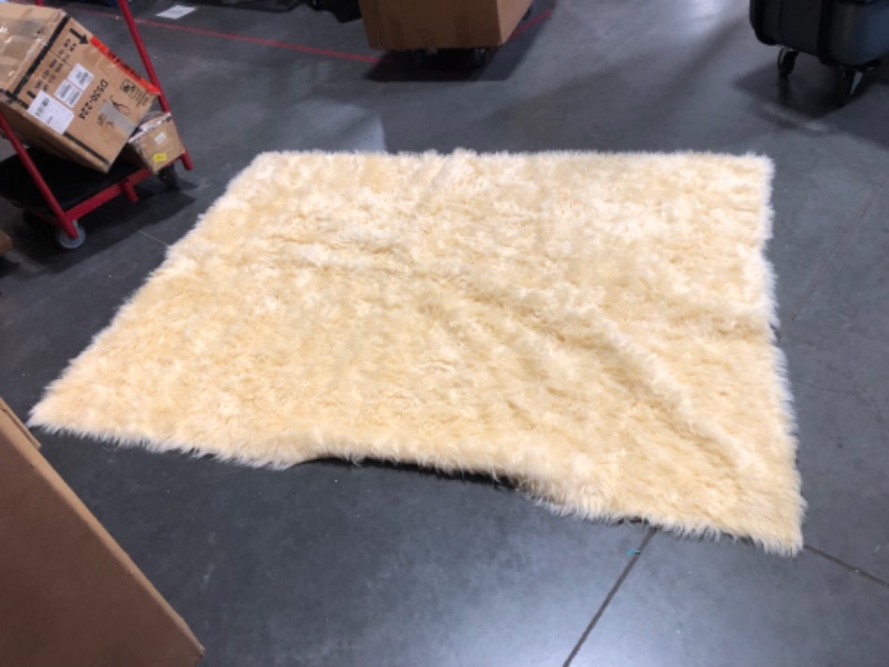 Photo 6 of ***DIRTY - SEE PICTURES***
68 Inches by 92 Inches Faux Sheepskin Rug Yellow