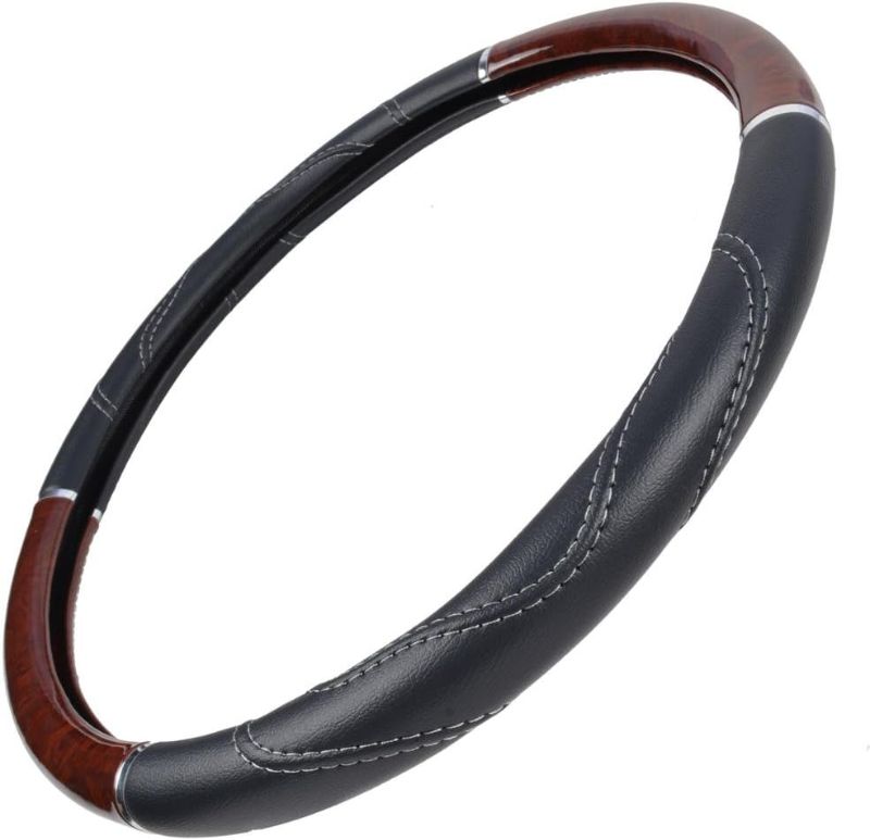 Photo 1 of *MINOR DAMAGE*
18 INCH BROWN/BLACK LEATHER STEERING WHEEL COVER