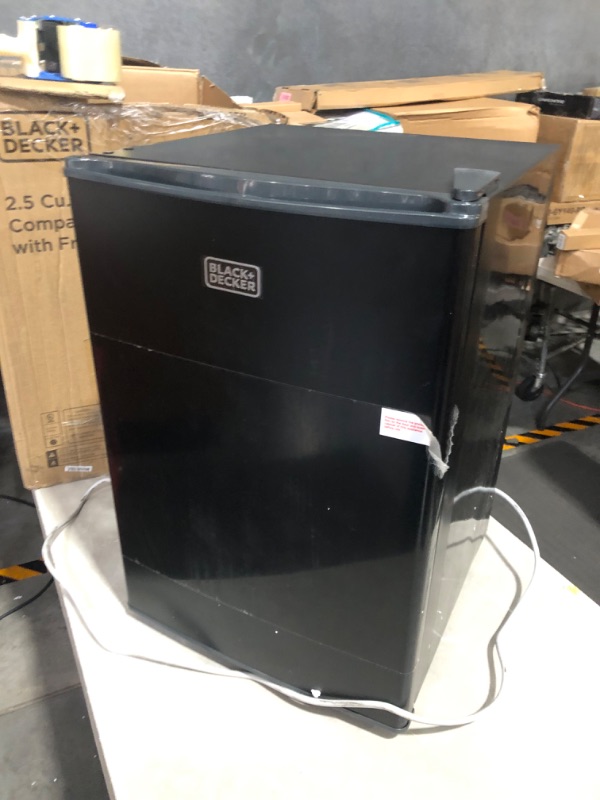 Photo 2 of ***NOT FUNCTIONAL - FOR PARTS ONLY - NONREFUNDABLE - SEE COMMENTS***
BLACK+DECKER BCRK25B Compact Refrigerator Energy Star Single Door Mini Fridge with Freezer, 2.5 Cubic Feet, Black
