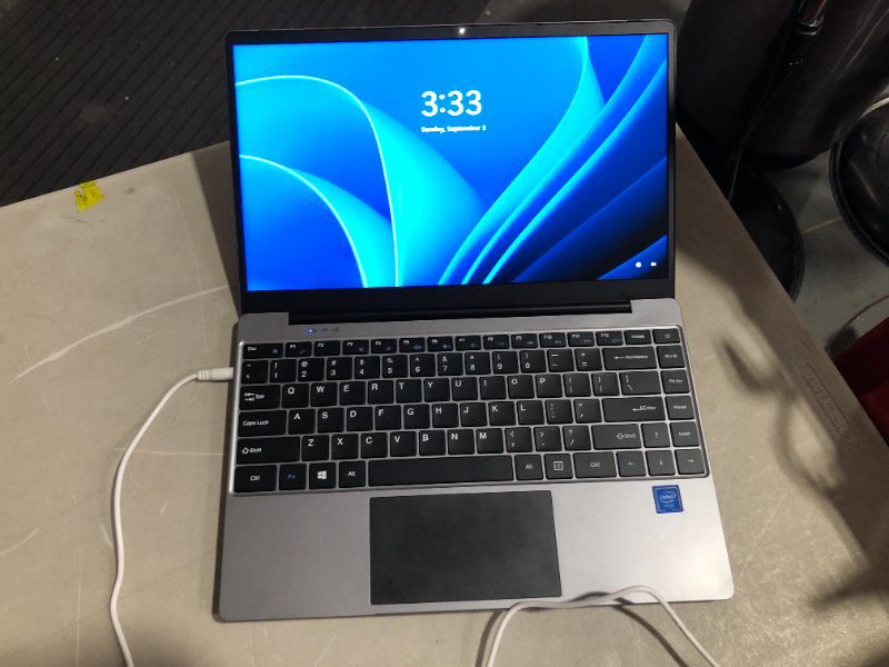 Photo 2 of TURNS ON**
VGKE [Windows 11 Pro] B14 Air Windows 11 Laptop Grey