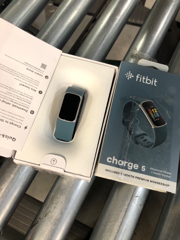 Photo 2 of Fitbit Charge 5 Blue Silicone Band Fitness and Health Tracker - Blue
