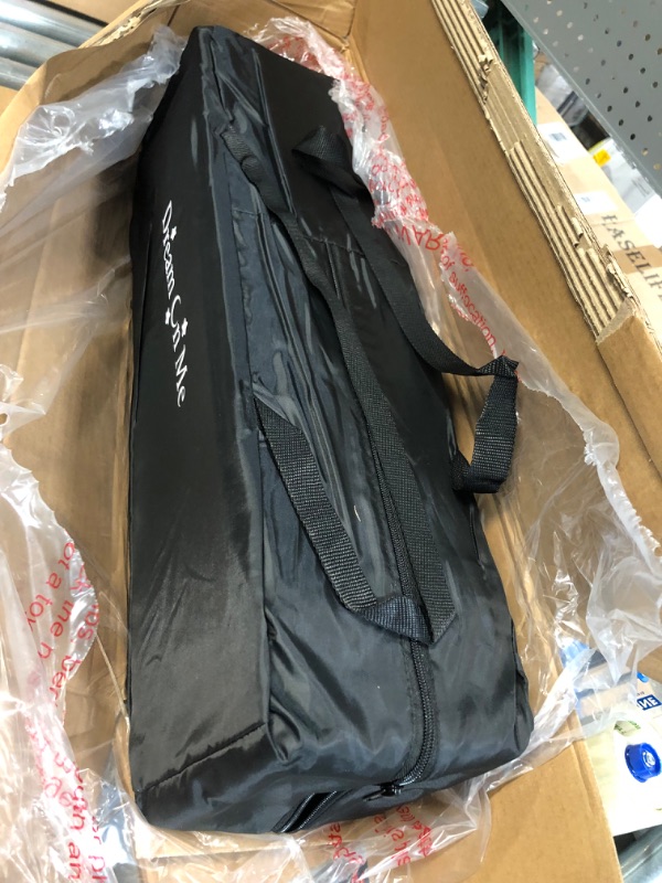Photo 1 of Dream On Me Nest Portable Play Yard With Carry Bag And Shoulder Strap, Black