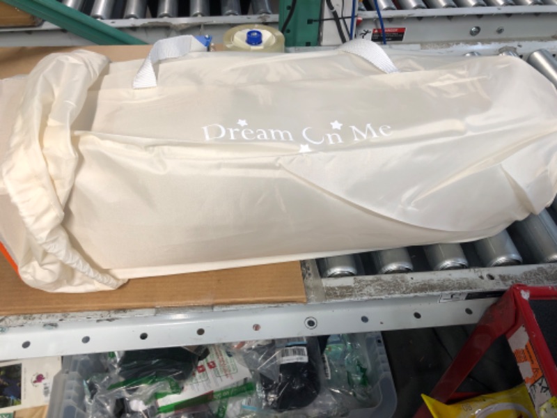 Photo 1 of Dream On Me Zodiak Portable Playard with Carry Bag & Shoulder Strap, Beige