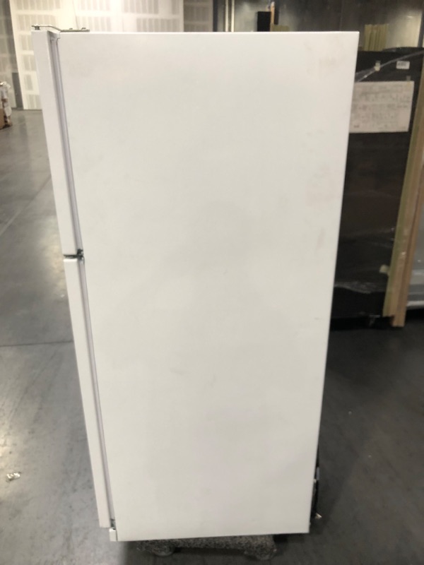 Photo 2 of [Used] Whirlpool 20.5-cu ft Top-Freezer Refrigerator (White)
