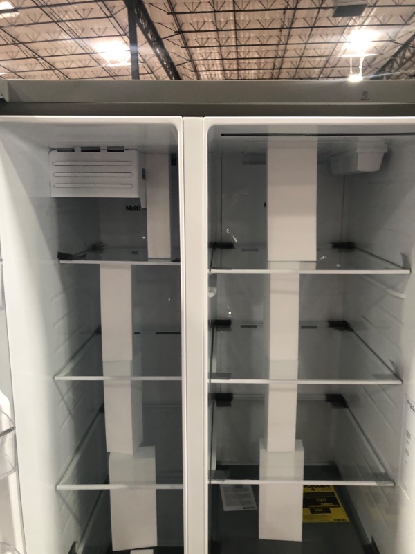 Photo 1 of LG - 28 cu. ft. Side by Side Refrigerator with External Water in Stainless Standard Depth