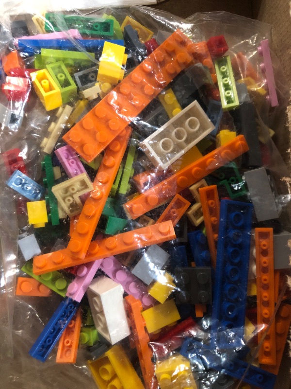 Photo 2 of 3 small bags of miscellaneous Legos