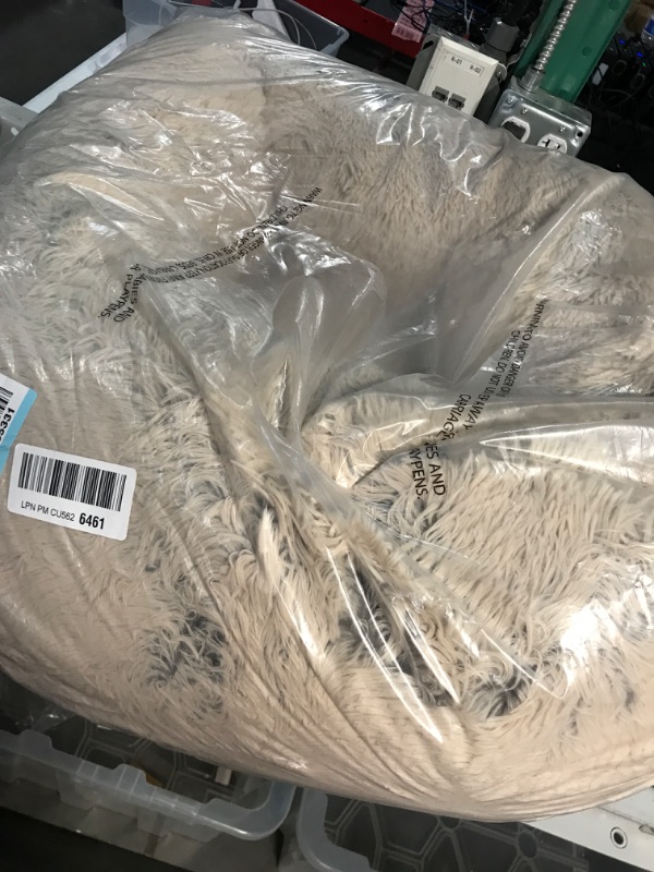 Photo 1 of * USED * 
Furhaven 30" Round Medium Donut Dog Bed Plush Long Faux Fur Calming Cuddler w/ Removable Washable Cover - Taupe, Medium Long Faux Fur (Taupe) Medium Donut Bed
