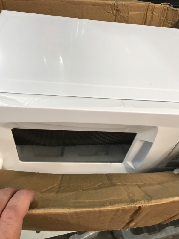 Photo 4 of * DAMAGED * 
COMFEE' EM720CPL-PMB Countertop Microwave Oven with Sound On/Off, ECO Mode and Easy One-Touch Buttons, 0.7cu.ft, 700W, WHITE 