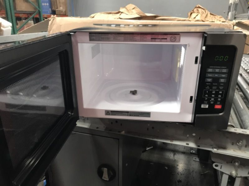 Photo 2 of **PARTS ONLY, NON-FUNCTIONAL, DENTS AND SCRATCHES** TOSHIBA EM131A5C-BS Countertop Microwave Ovens 1.2 Cu Ft, 12.4" 1100W Black Microwave Oven