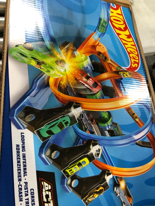 Photo 1 of * USED * 
Hot Wheels Track Set and Toy Car, Large-Scale Motorized Track with 3 Corkscrew Loops, 3 Crash Zones and Toy Storage??
