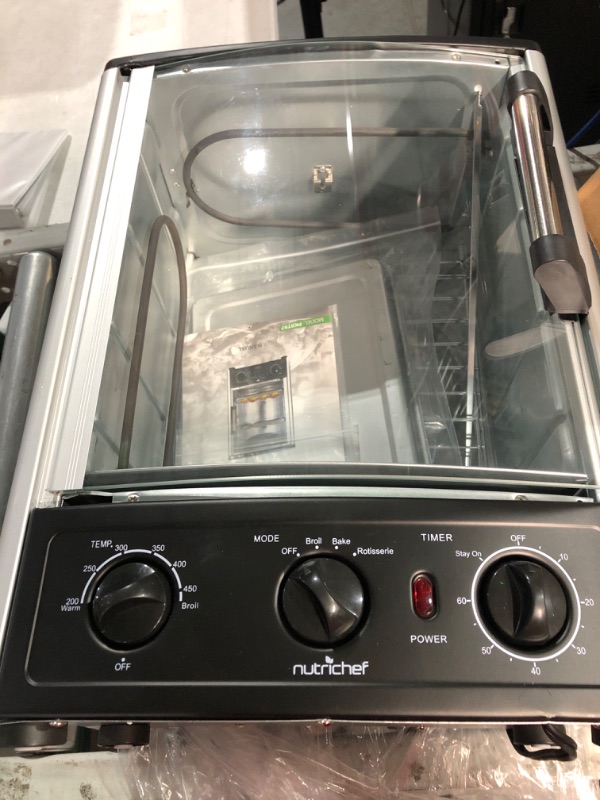 Photo 3 of * DAMAGED * 
Nutrichef Upgraded Multi-Function Rotisserie Oven - Vertical Countertop Oven with Bake, Turkey Thanksgiving, Broil Roasting Kebab Rack with Adjustable Settings, 2 Shelves 1500 Watt - AZPKRT97