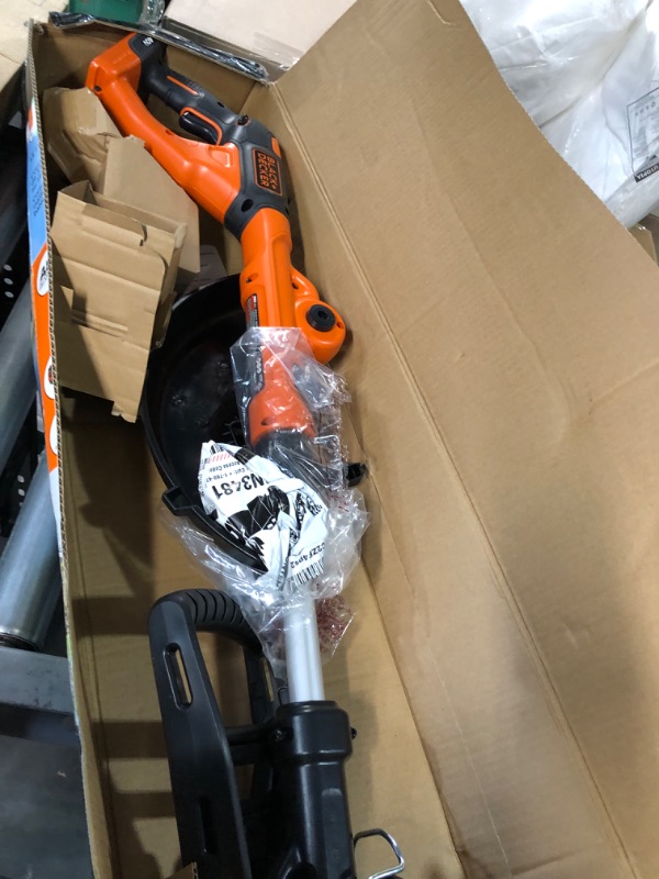 Photo 6 of * item used * minor tear and wear *
BLACK+DECKER LST140C String Trimmer + 40-Volt Battery Pack Kit w/ extra 2.0 AH Battery