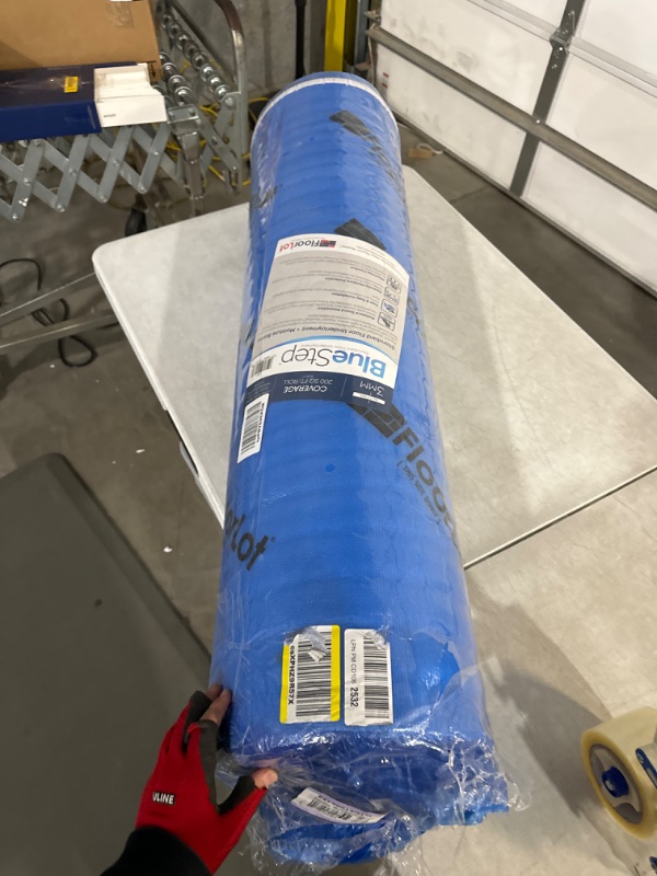 Photo 1 of ***USED LIKE NEW***Floorlot Blue Flooring Underlayment with Moisture Barrier for Laminate and Hardwood Floors, (3mm Thick, 200 sq.ft Roll)