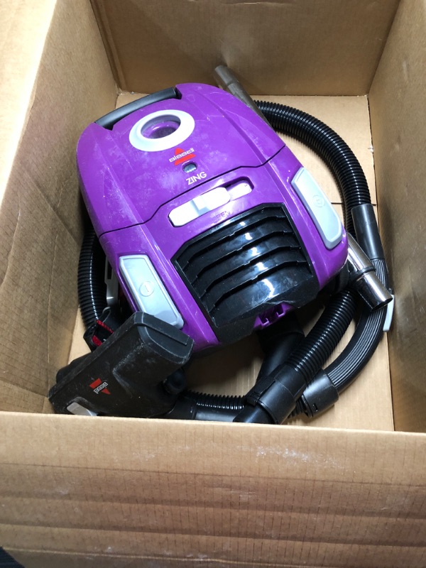 Photo 2 of (will not power on)(sold for parts)BISSELL Zing Lightweight, Bagged Canister Vacuum, Purple, 2154A
