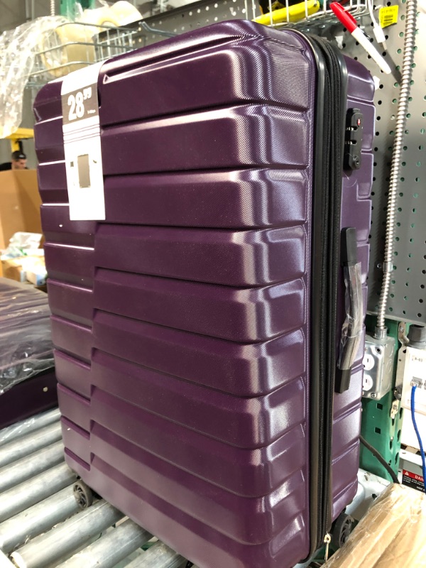 Photo 1 of 28' suitcase purple 