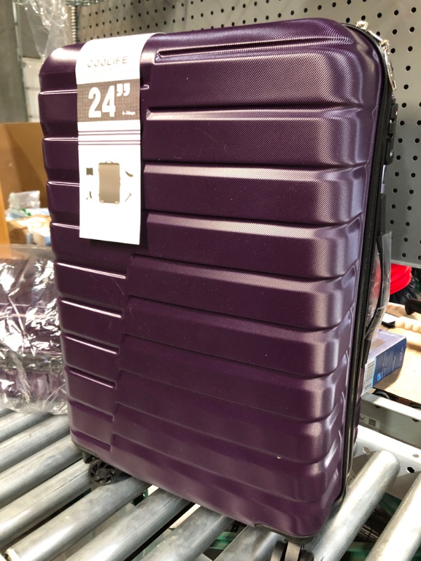 Photo 1 of 24' suitcase purple 