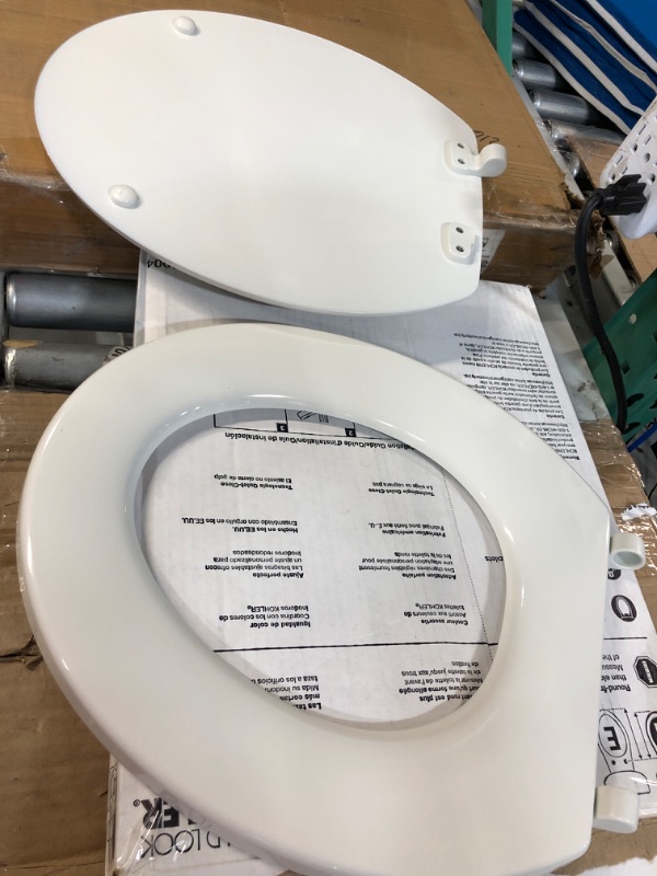 Photo 2 of **FOR PARTS ONLY** NEEDS REPAIR  KOHLER Stonewood® Quiet-Close™ Round-front, Slow-Close, Wood, White toilet seat, K-20467-0, White White Round