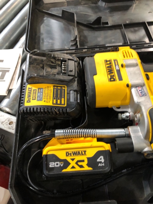 Photo 1 of DEWALT DCGG571M1 20 Volt Max Lithium Ion Grease Gun Kit
