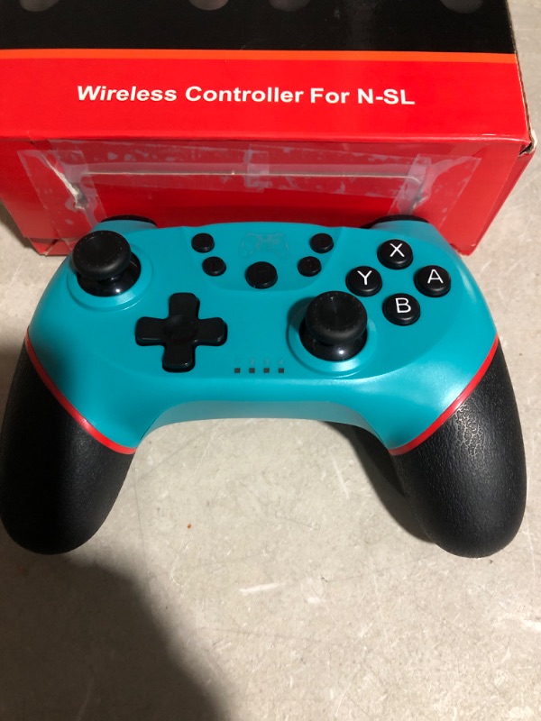 Photo 2 of * not functional * sold for parts * 
Diswoe Wireless Pro Controller Gamepad Compatible with Switch Support Amibo, Wakeup, Screenshot and Vibration Functions-Blue
