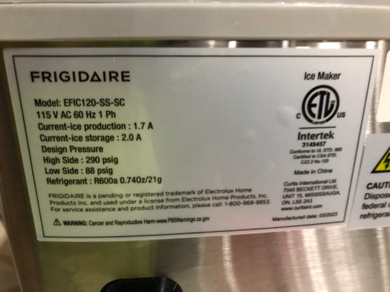 Photo 9 of **DAMAGE** **SEE PHOTOS** **POWERS ON** Frigidaire EFIC117-SS 26 Pound Ice Maker, 26 lbs per day, Stainless