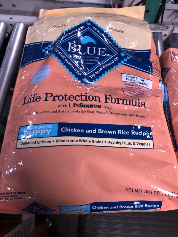 Photo 2 of **EXPIRES 11/21/23**
Blue Buffalo Life Protection Formula Natural Puppy Large Breed Dry Dog Food, Chicken and Brown Rice 30-lb 30 Pound (Pack of 1)