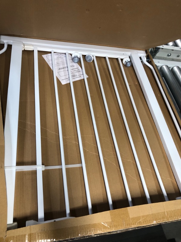 Photo 2 of BalanceFrom Easy Walk-Thru Safety Gate for Doorways and Stairways with Auto-Close/Hold-Open Features, 29.1 - 33.8" Wide