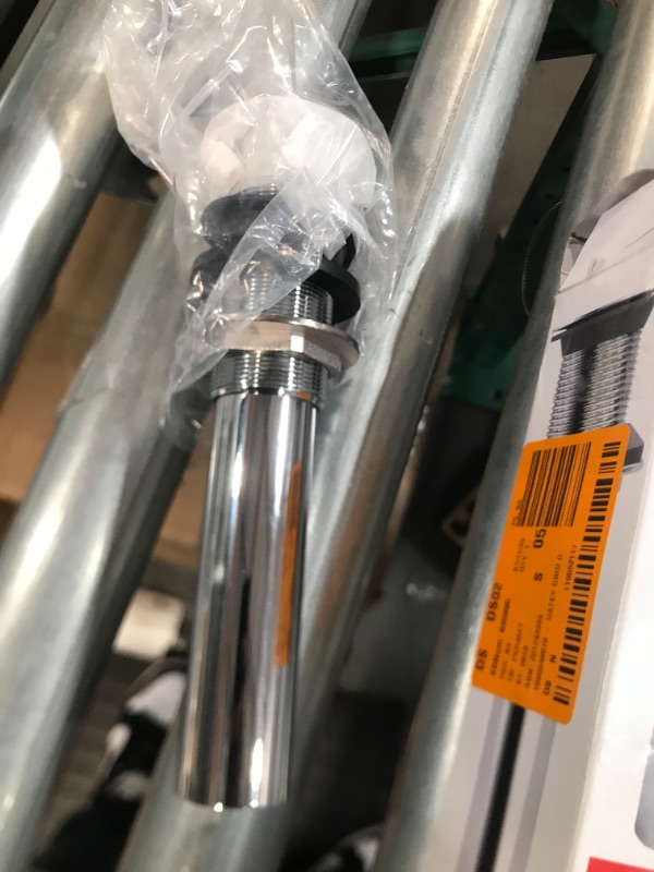 Photo 1 of 1 1/4 over flow plastic basin plug