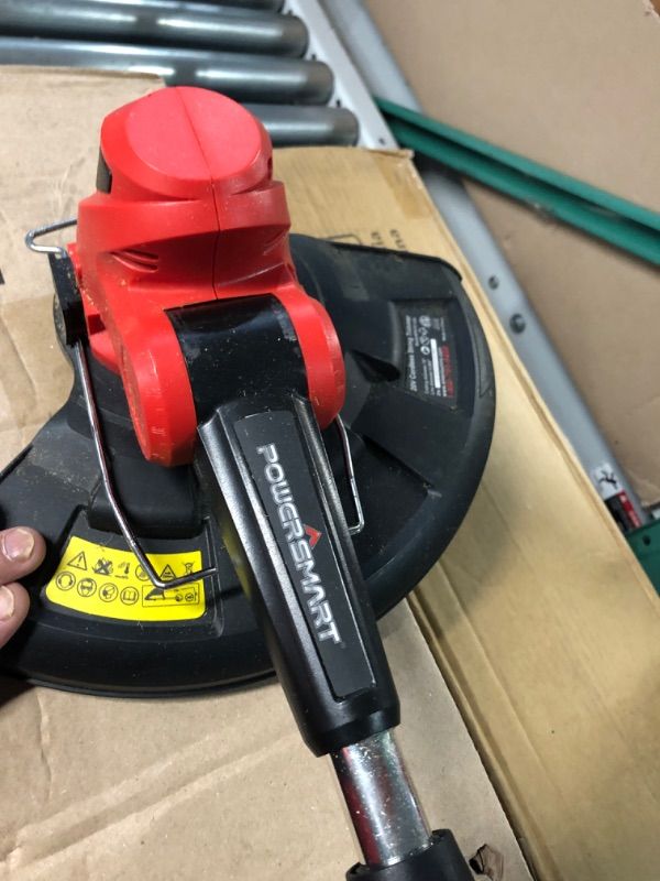 Photo 3 of ****USED*****
PowerSmart String Trimmer, 20 Volt Lithium-Ion Cordless String Trimmer with 10-INCH Cutting Diameter , 2-in-1 Cordless Trimmer/Edger only 7. 5 pounds, PS76110A Red
