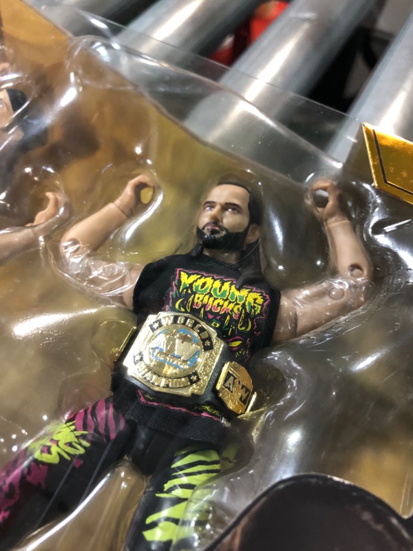 Photo 1 of All Elite Wrestling AEW UNRIVALED 2 Pack - The Young Bucks - 6-Inch Matt Jackson and Nick Jackson Figures with Accessories, Multi 