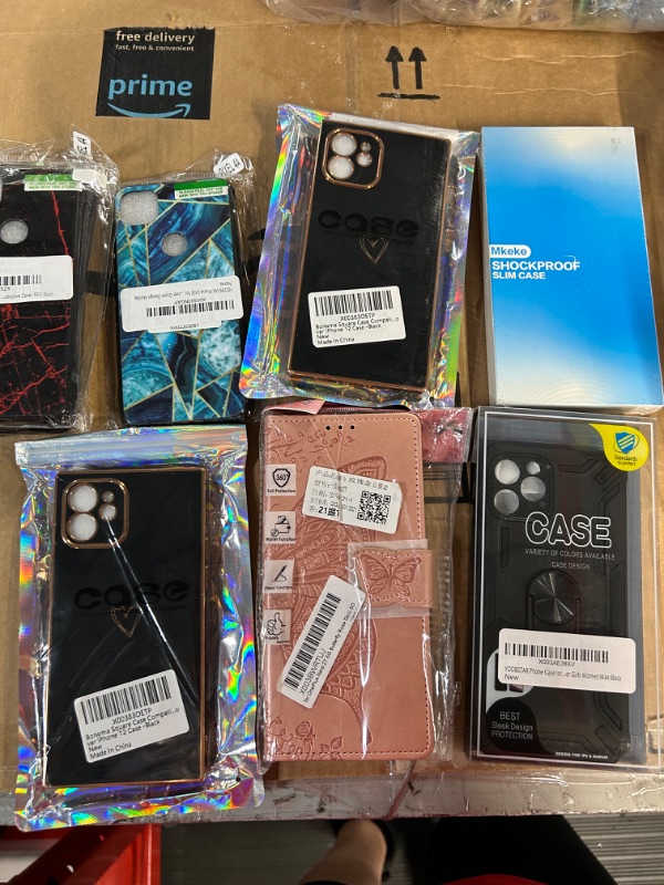 Photo 1 of **NON-REFUNDABLE, MISCELLANEOUS PHONE CASES/SCREEN PROTECTORS BUNDLE**
